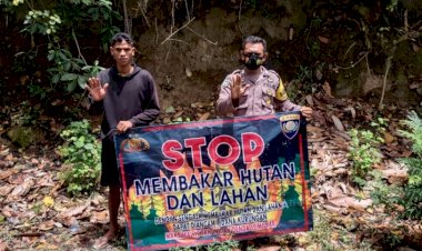 Bentangkan-Spanduk,-Bhabinkamtibmas-Polsek-Nangapanda-Himbau-Warga-Untuk-Cegah-Karhutla