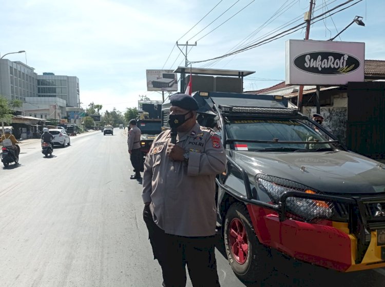 Perkuat PPKM Mikro, Personel Satbrimobda NTT Gelar Patroli Imbau Prokes di Kota Kupang