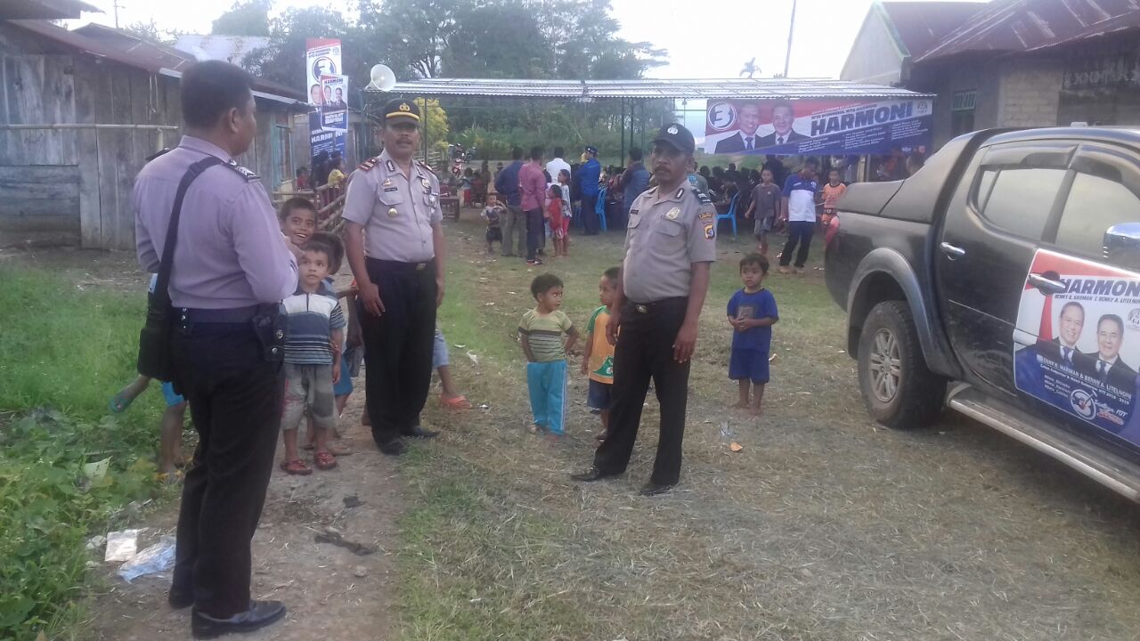 Personil Polsek Cibal melaksanakan pengamanan Kampanye paket Harmoni di wilayah kecamatan Cibal